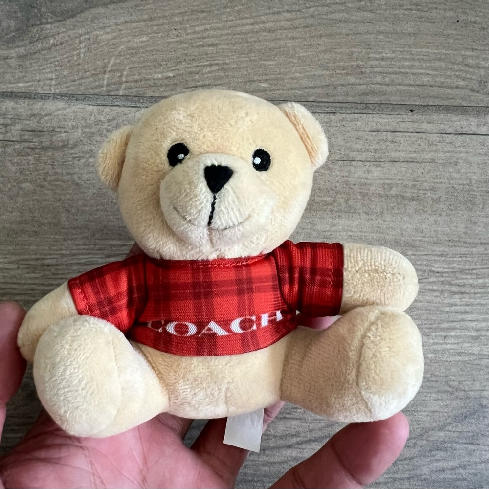Coach teddy bear ( no ring on top )
